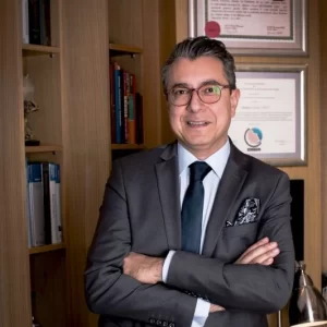 Dr. Göksel, an internationally recognized ENT specialist, in his clinic in Istanbul.