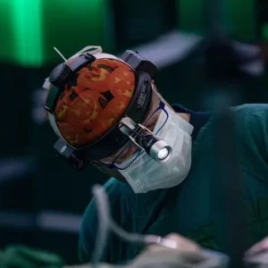 Close-up of Dr. Göksel performing nasal surgery in the operating room.