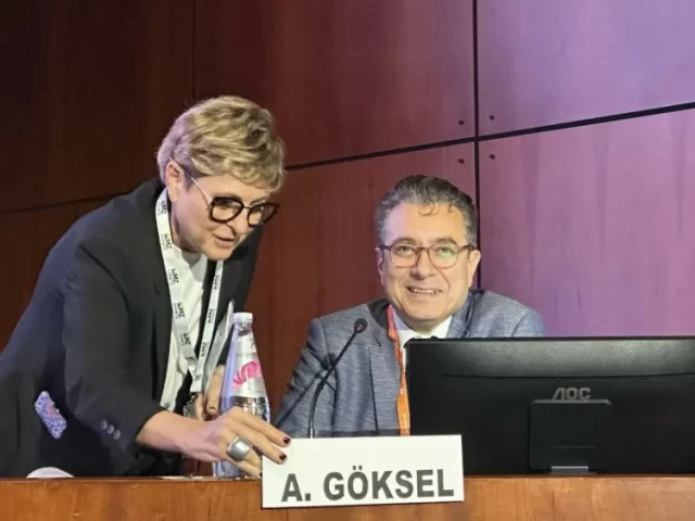 Dr. Göksel preparing for a panel discussion at an international ENT congress.